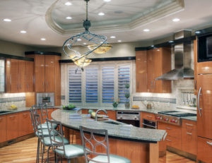 Kitchen with Shutters and Granite Countertop - Home on the Lake