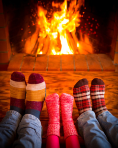 warming feet by the fire